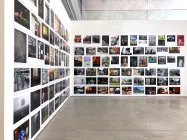 A wall of painting and art.